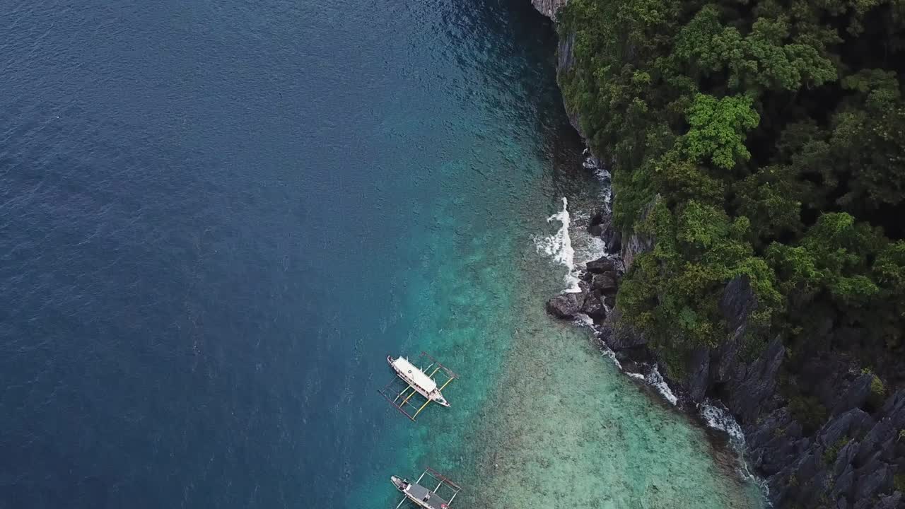 Tropical Beach Lagoon, Coral Reef and Boats in El Nido, Palawan Island, Philippines, Birds Eye Aerial View
