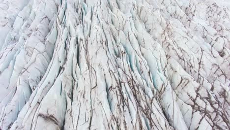 the 4k drone captures unique aerial cinematic shots of iceland's glaciers within iceland national park, resembling sharp blades of ice