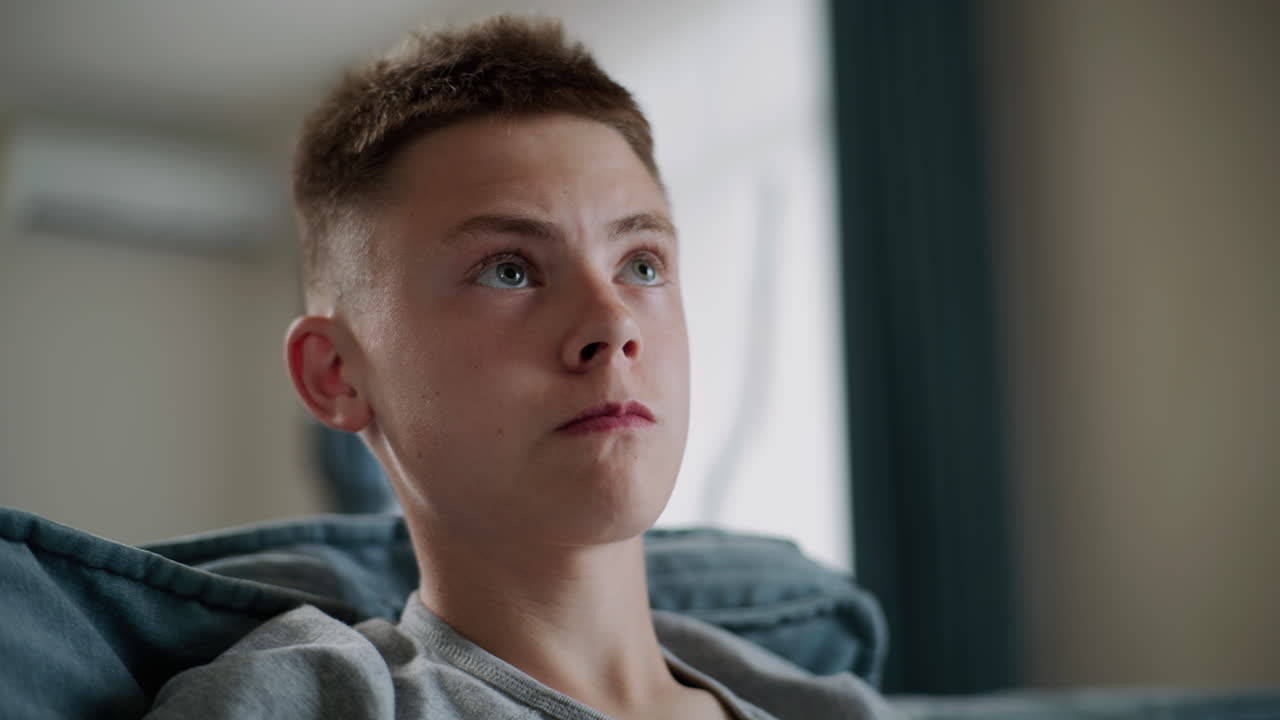 Teenage Boy Looking Up