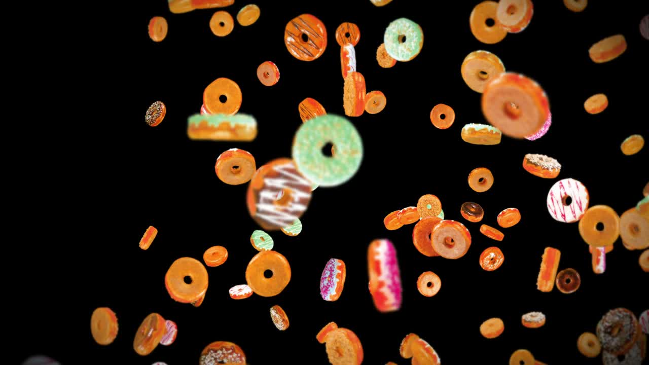 검은 바탕에 많은 다채로운 도을 날아. 도 케이크, 과자, 디저트. 도 회전의 3d 애니메이션. 루프 애니메이션.