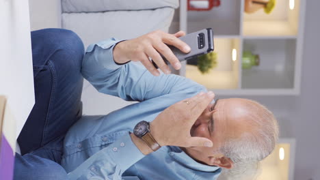 Vertical-video-of-The-old-man-who-misses-his-wife.