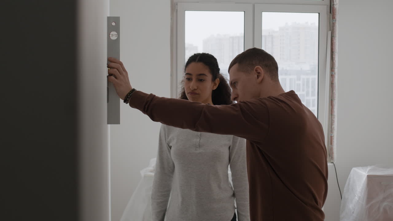 Couple Working Together on Home Renovation Project