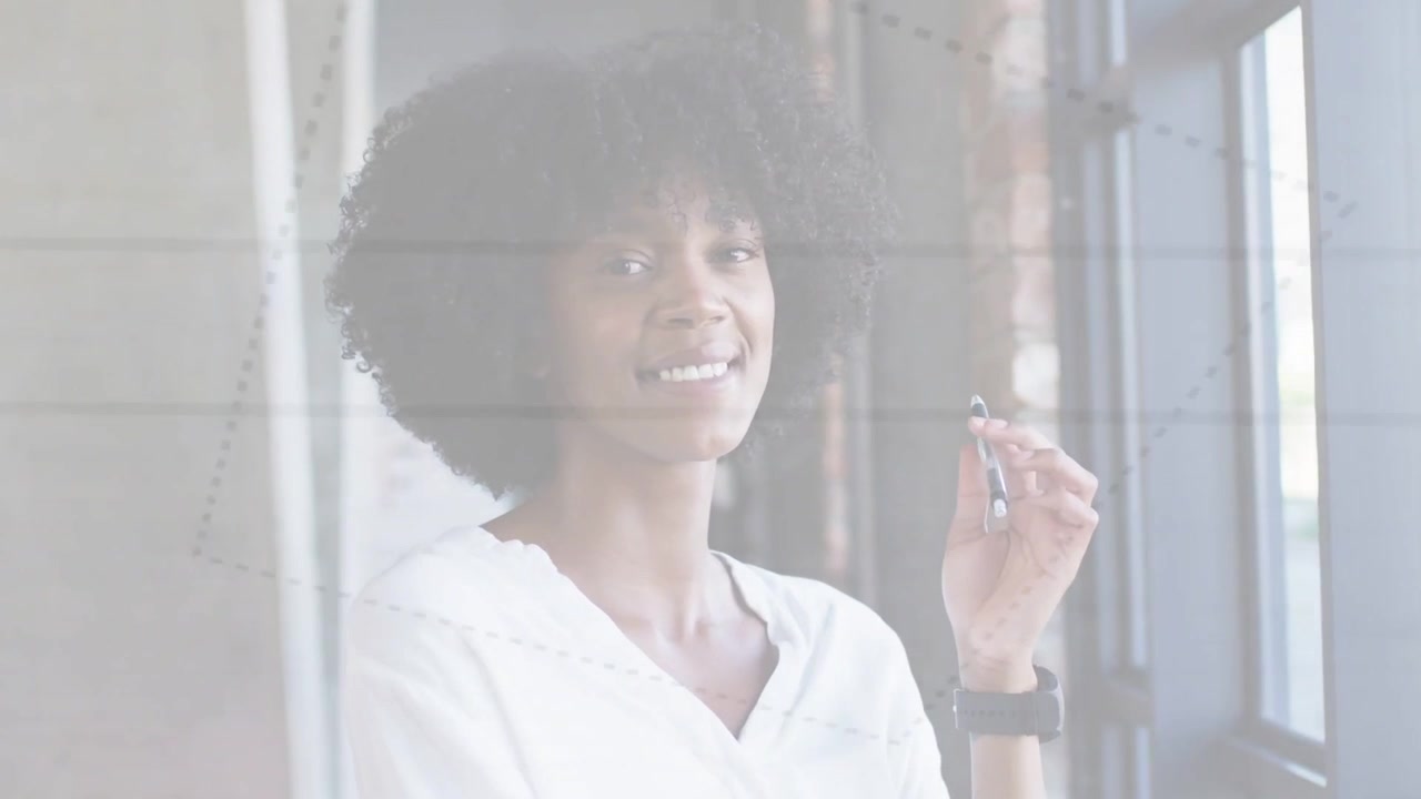 Office woman gazing out multi-pane window, sunlight reflecting, raising stylus and considering idea