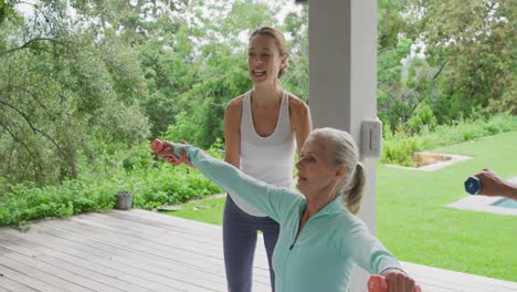 senior woman exercising in a garden