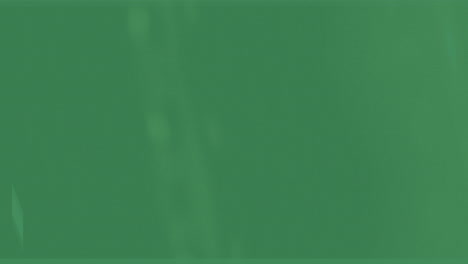 a close-up of dark green-stained surface with glossy finish and vertical grain pattern is depicted in the image, creating a visually appealing texture and pattern