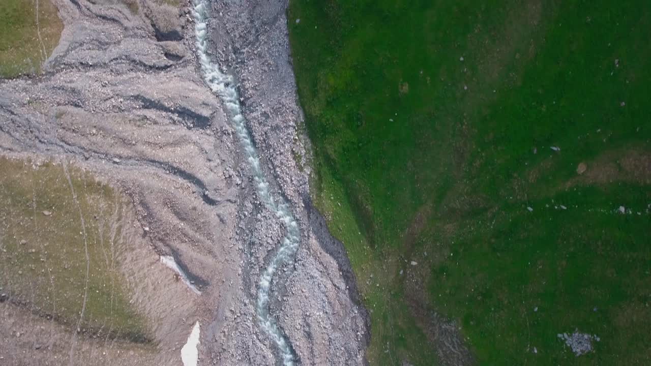 Drone shot above the French Alps in early summer 6