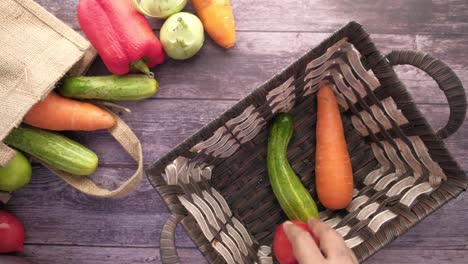 fresh vegetables in a basket and shopping bag