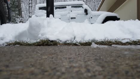 low set drone showing inches of snowfall in mid march