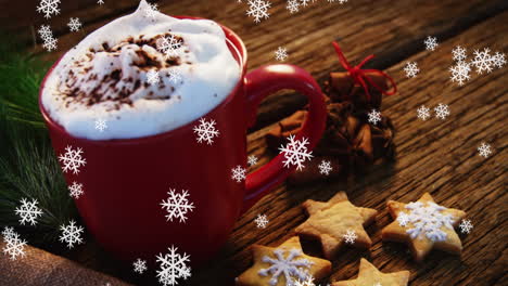 animación de una taza de chocolate caliente con copos de nieve