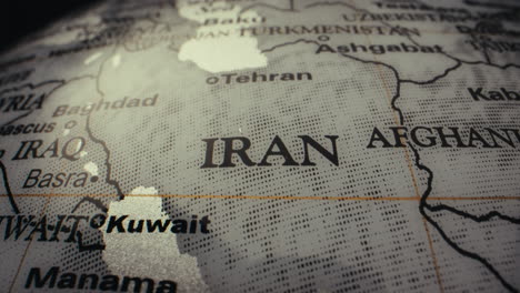 close-up view of a world map, highlighting iran and afghanistan.