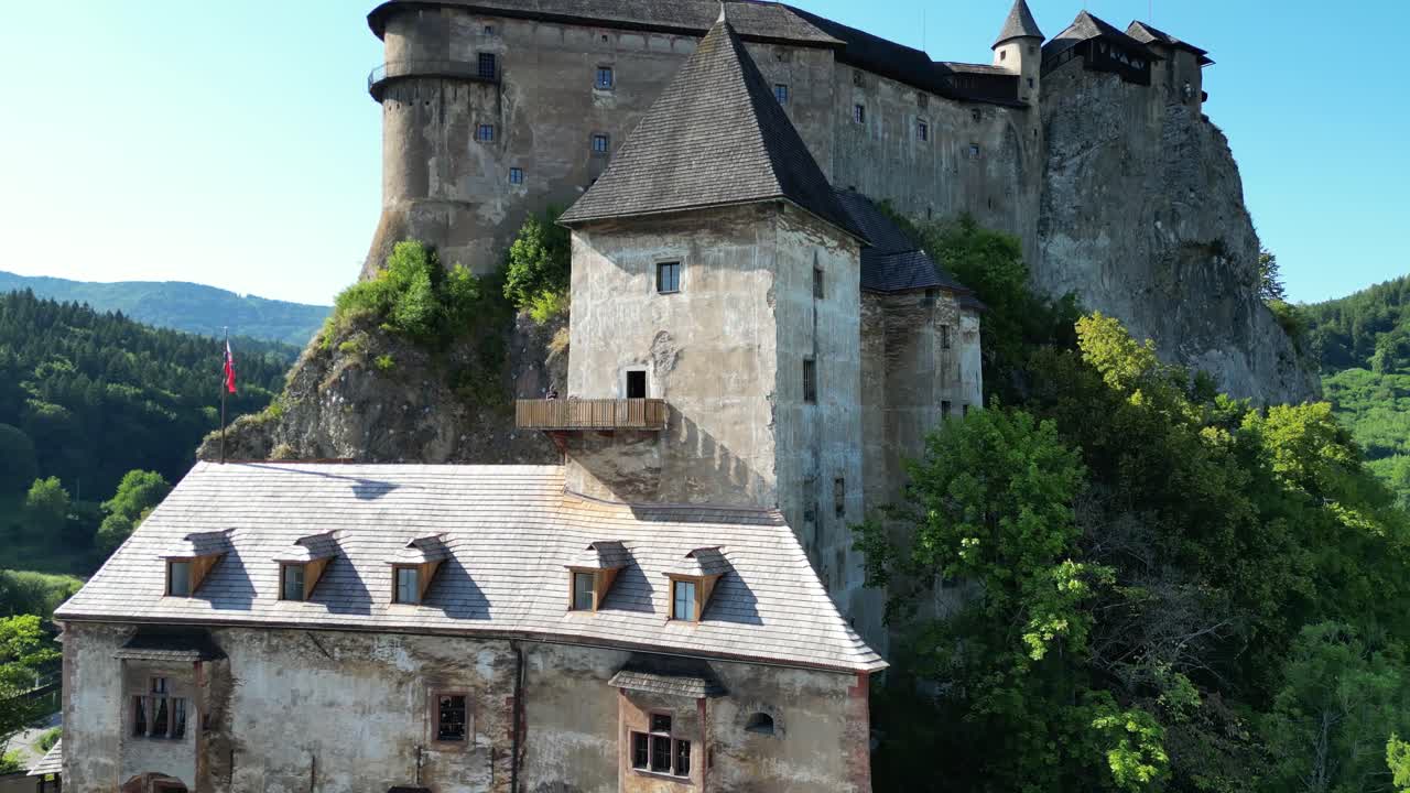 Majestic Orawski castle Oravský hrad aerie medieval fortress during a beautiful summer day 4K aerial