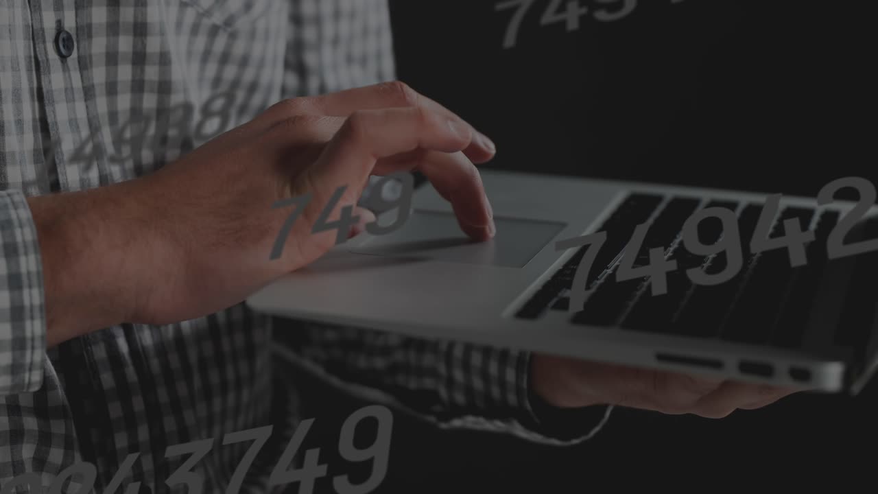 Animation of data processing over hands using laptop