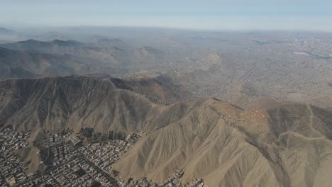 an overview of the houses in the vast hills of lima peru