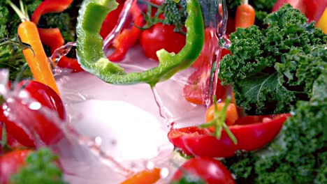 green pepper falling into water