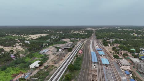 an aerial video of rameshwaram railaway station, captured from a drone, would offer a breathtaking view of this serene island town.