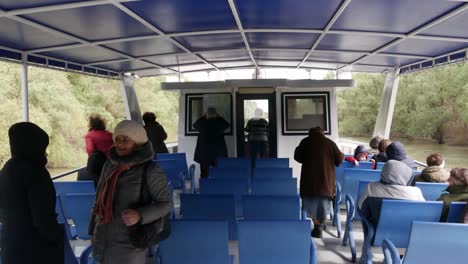 delta of the danube river. romania. april 20, 2019. tourists on the deck of a cruise ship.