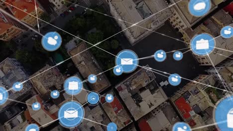 animation of network of connections with icons over cityscape