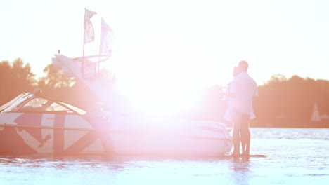 happy couple relaxing together on yacht. success and luxury lifestyle