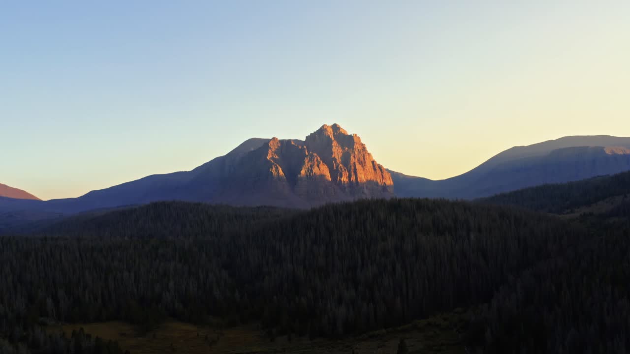 Stunning aerial drone landscape nature shot of the beautiful Red Castle Lake mountain up in the high Uinta's between Utah and Wyoming on a backpacking trip during a summer sunset.