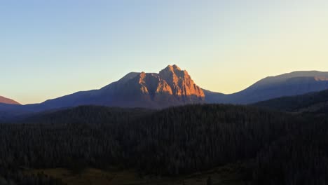 stunning aerial drone landscape nature shot of the beautiful red castle lake mountain up in the high uinta's between utah and wyoming on a backpacking trip during a summer sunset.