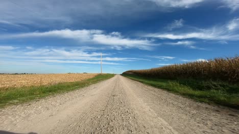 point of view footage while driving down a gravel road in rural iowa