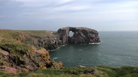 Long-shot-of-Bullers-cliffs-looking-to-Dunbuy-arch