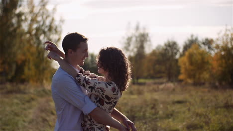hugging couple glowing with happiness