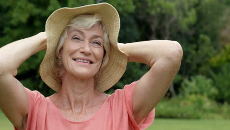 happy senior woman posing alone