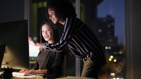 two young businesswomen working together