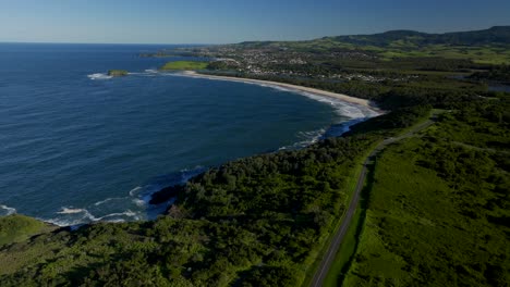 mystics farm surfing break killalea minnamurra beach illawarra state park aerial drone shellharbour wollongong australia nsw sydney south coast shell cove stack rangoon island sun bluesky forward pan