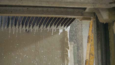 Close-Up-Shot-Of-Saw-Machine-Cutting-Marble-Block-Stone