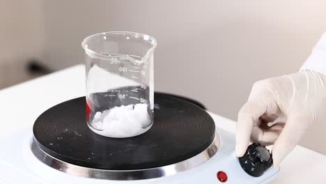 observing sodium acetate crystallization in a beaker