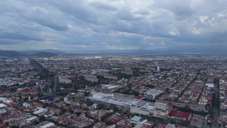 panning aerial shot of mexico city on a gloomy, overcast day