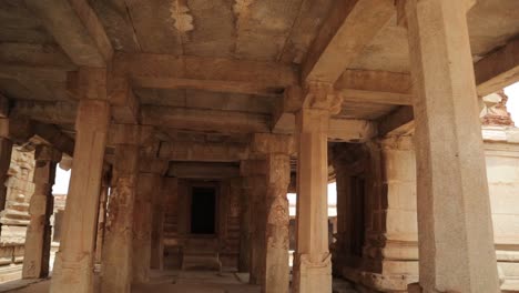 Pan-view-of-Roofs-of-Hampi,-Constructed-during-14th-century-CE-made-with-heavy-thick-granite-slabs-covered-with-a-waterproof-course-of-brick-jelly-and-lime-mortar