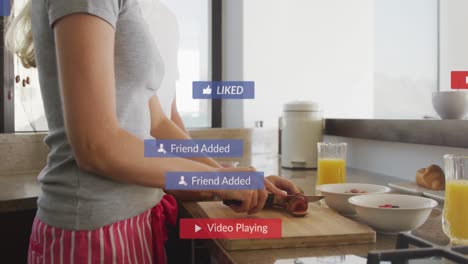 Animación-De-Notificaciones-En-Redes-Sociales-Sobre-Una-Mujer-Preparando-El-Desayuno-En-Una-Cocina-Soleada
