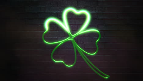 green neon shamrock on brick wall