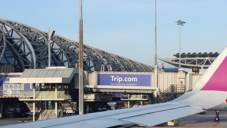 airport scene with airplane at the gate