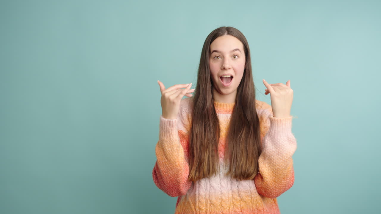 Shocked young woman with opened mouth