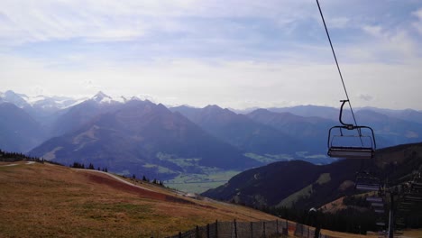 Ski-Lifts-At-The-Schmittenhohe-Mountain-With-A-View-Of-Kitzbuhel-Alps-In-Austria