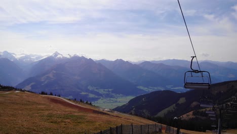 ski lifts at the schmittenhohe mountain with a view of kitzbuhel alps in austria