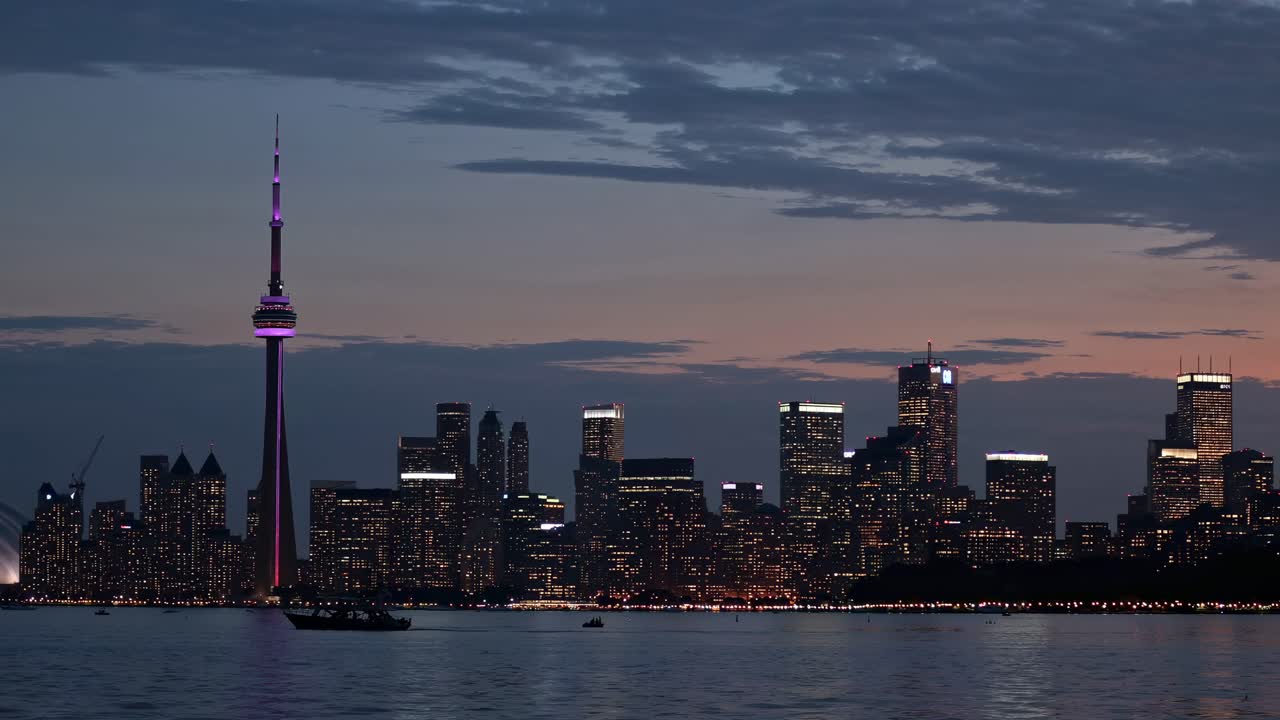 A stunning video concept of Toronto's skyline at dusk, captured from a low angle across the water