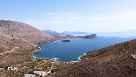 aerial side panning shot of a stunning bay in albanian riviera