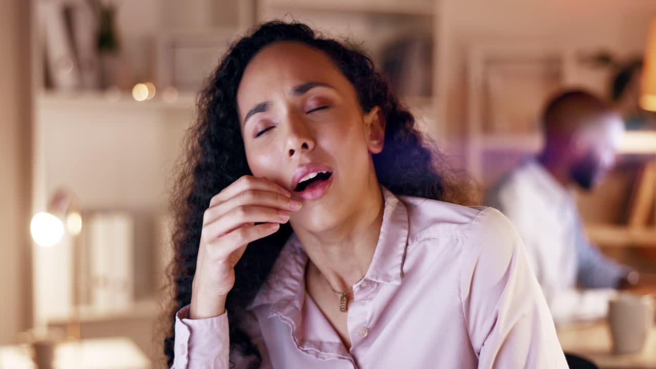 Tired, bored and a woman yawning at work during