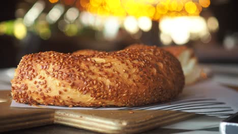 close-up of a simit (turkish bagel) with sesame seeds