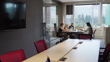 colleagues working at office desk