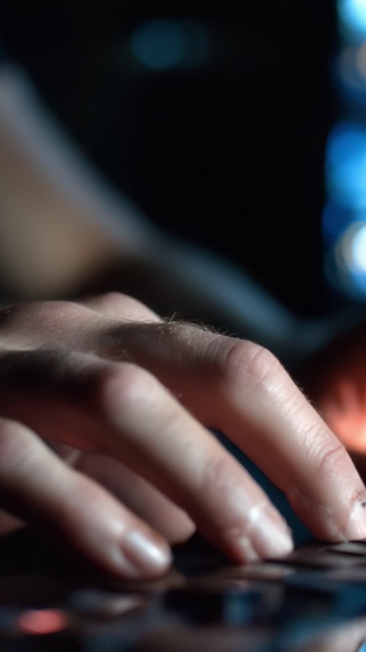 Close-up of a Hand on a Keyboard: Capturing the Intensity and Focus of Digital Interaction in a Dark Environment