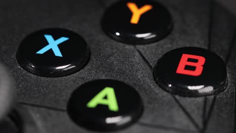 modern gamepad on a dark. game controller close-up.