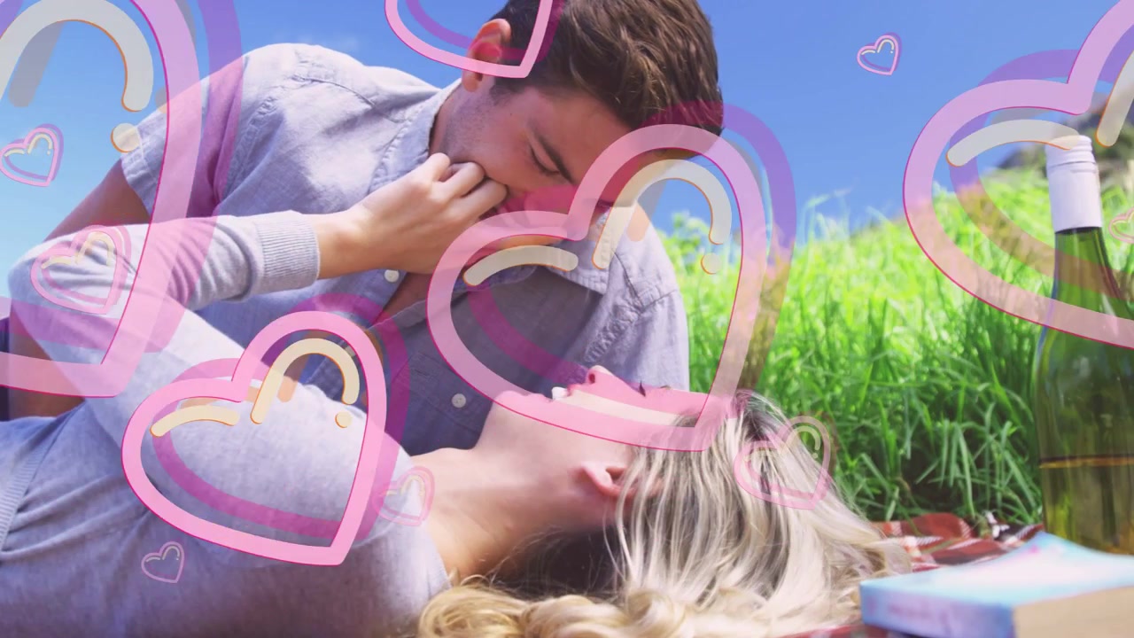 Kvinne tilbyr finger under piknik, mann kysser fingeren, rosa hjerter svever, flørting for dating.