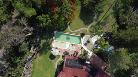 big house with garden and pool, aerial shot