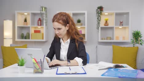 ambitious and determined portrait of home office worker woman.